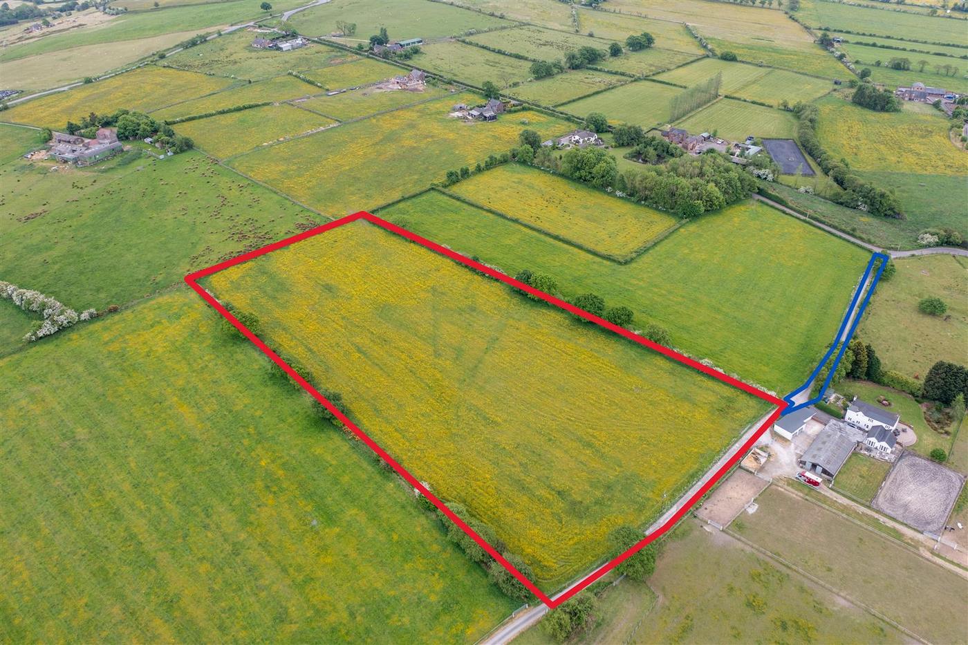Aerial view of a land parcel with its boundary marked